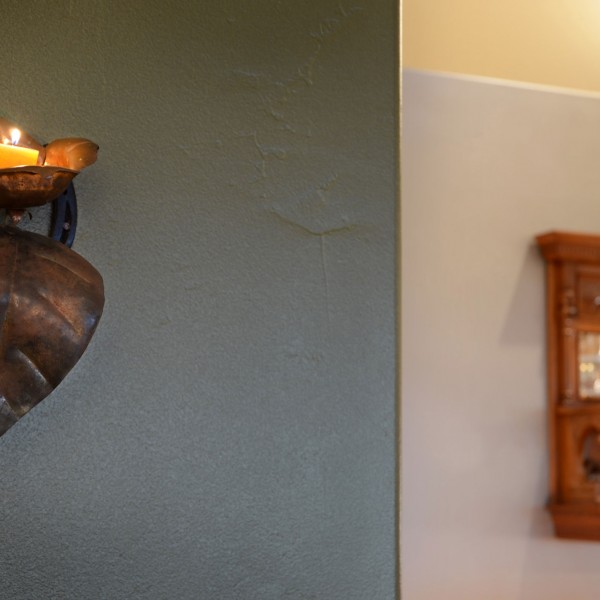 This lovely candle sconce was hand forged and hammered by the homeowner’s farrier.