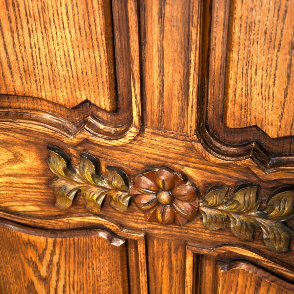 Hand applied color glazing on towering, hefty oak doors is the perfect Spanish detail.